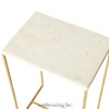 Side table with a white marble top and a brass metal frame. 60cm white