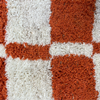 Geruite loper oranje