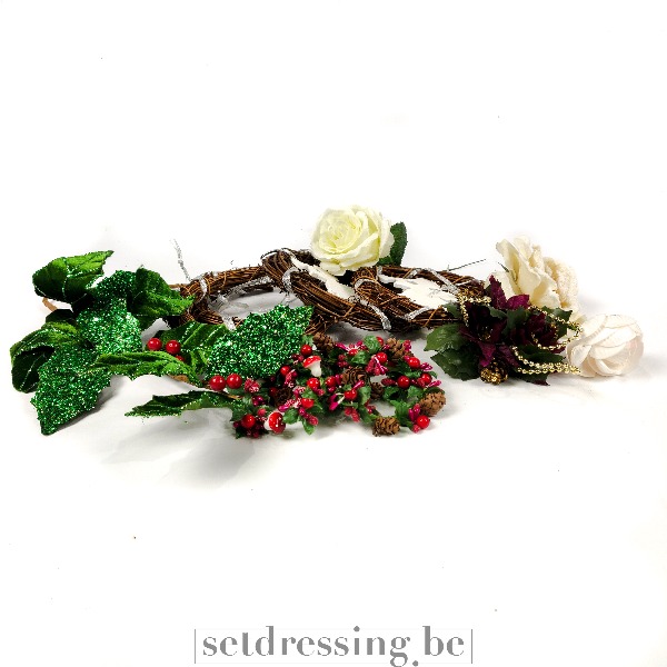 Kerstdecoratie tafelversiering bloemen en kransen