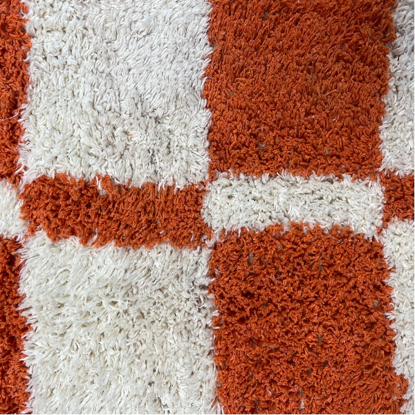 Geruite loper oranje